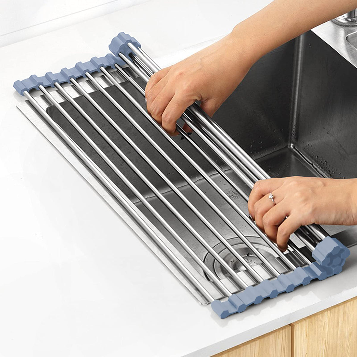 Mecheer over-the-sink rack rolled up for space saving and quick storage.