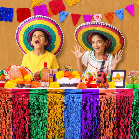 Mega-L Day of the Dead accents add metallic shine to celebratory tabletops.