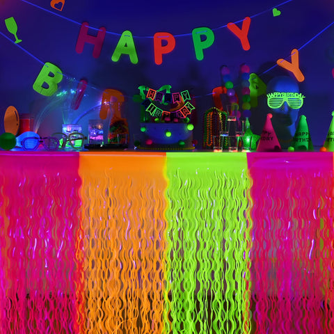 Mega-L Glow in the Dark table skirt in yellow brightens dessert tables.
