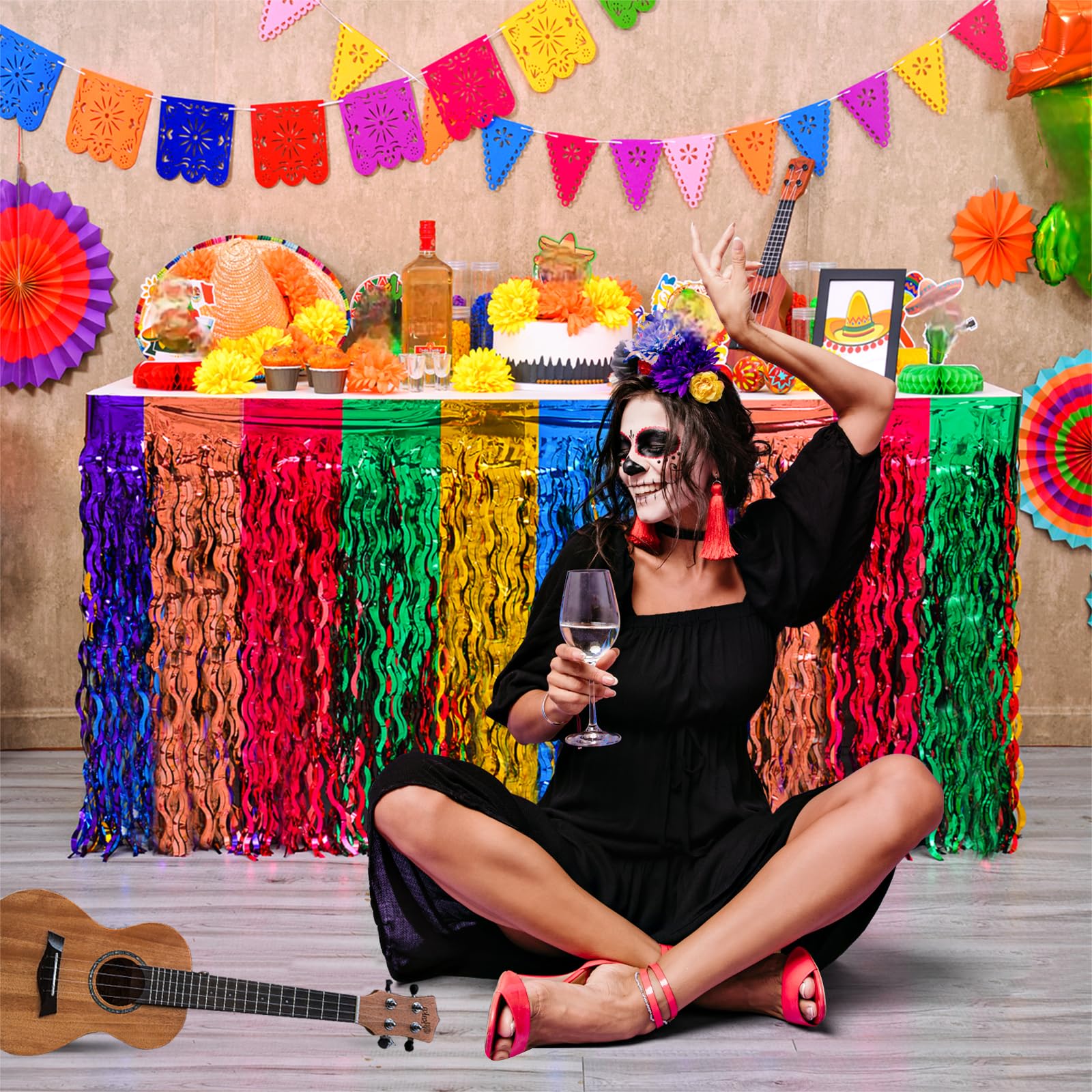 Mega-L foil fringe table cloth adds dynamic shimmer to Mexican party tables.