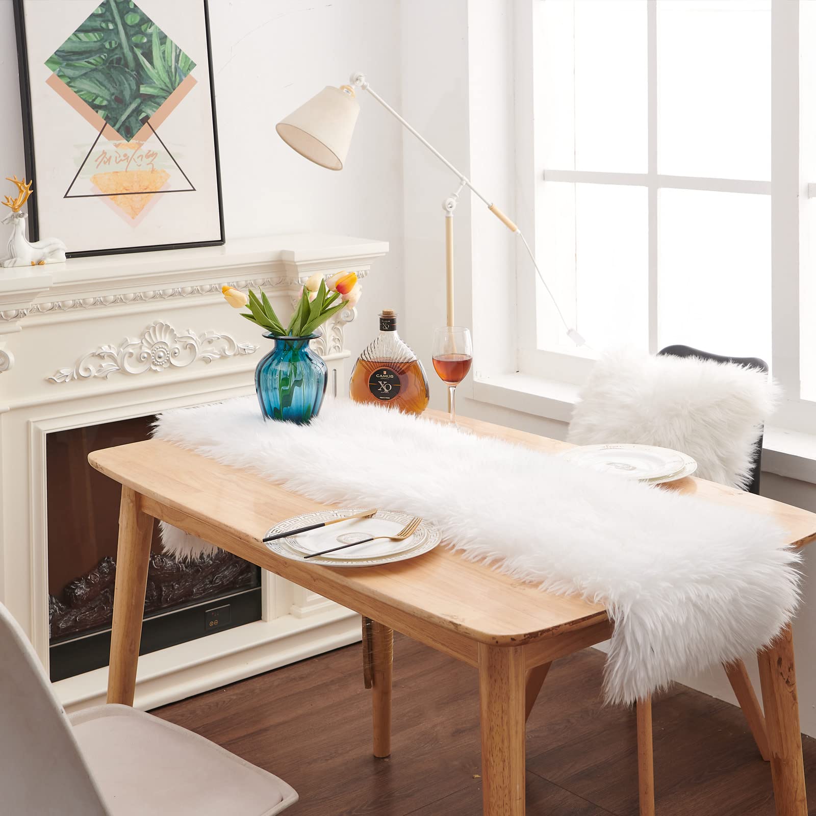 MeiSan white faux fur runner on farmhouse dining table.