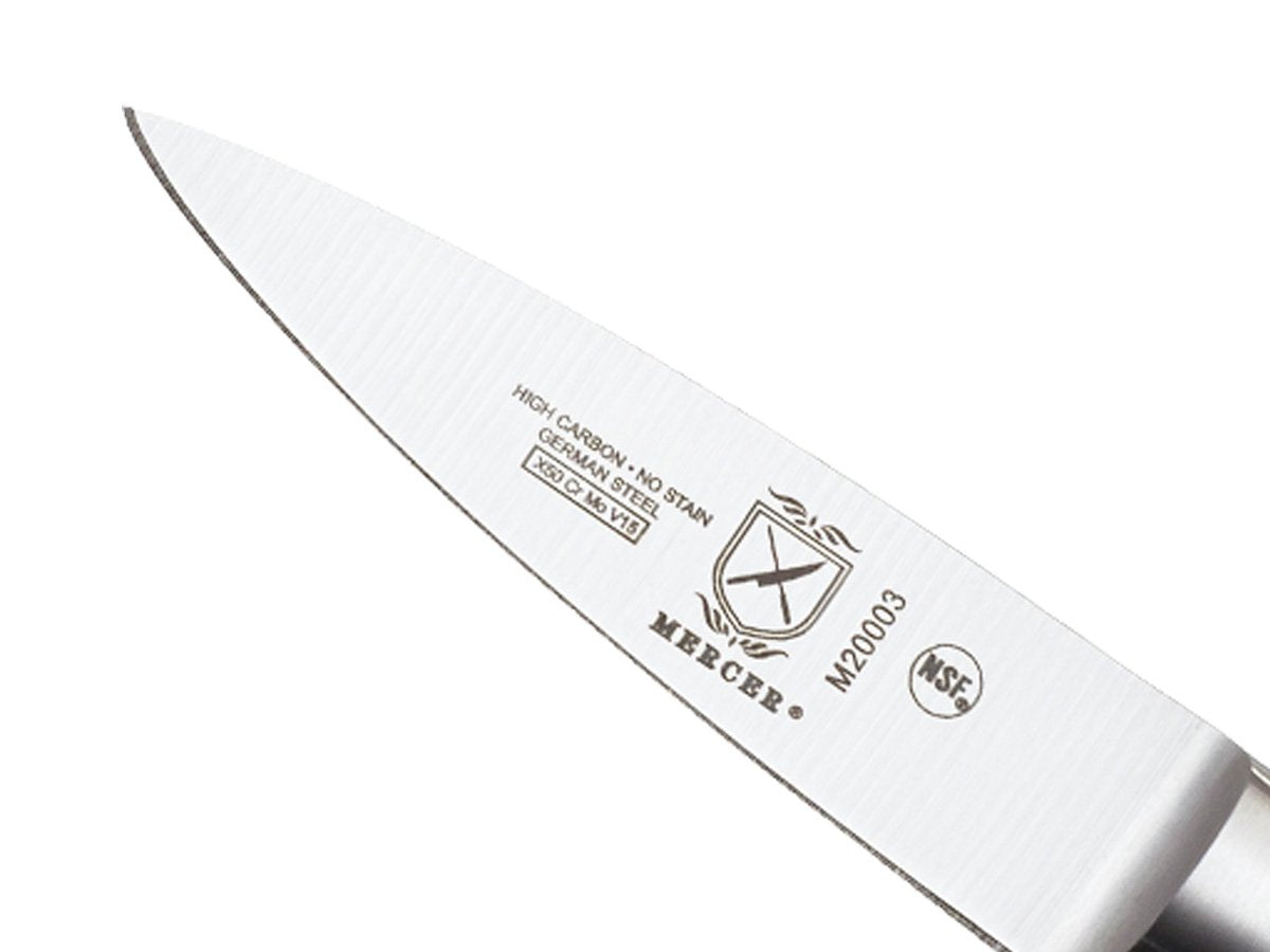 Mercer Genesis paring knife in prep scene demonstrating garnish and trimming capabilities
