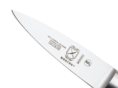 Mercer Genesis paring knife in prep scene demonstrating garnish and trimming capabilities