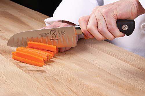 Mercer Genesis Santoku knife in kitchen use for chopping and mincing.