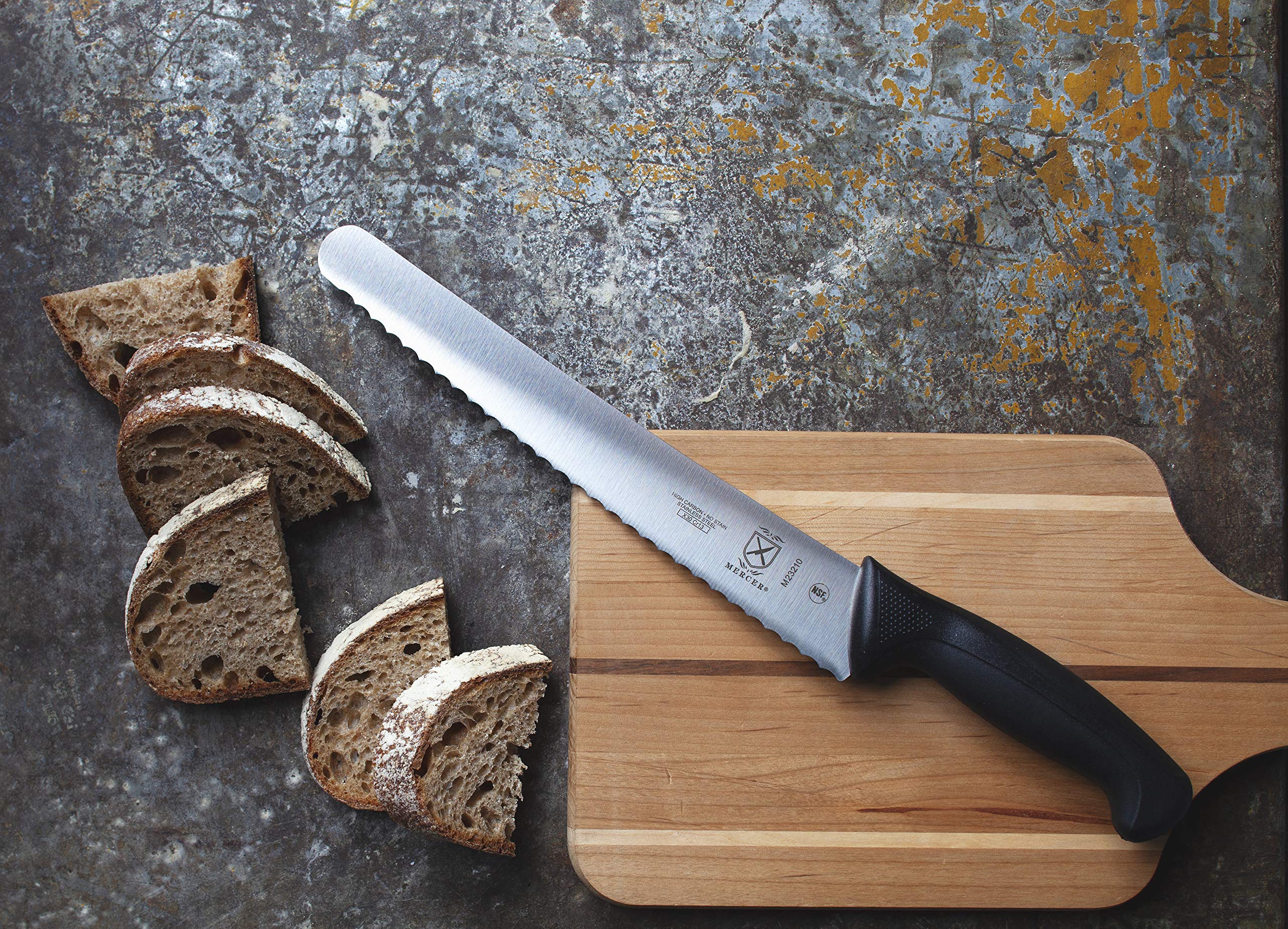 Mercer Millennia bread knife slicing through crust without tearing.