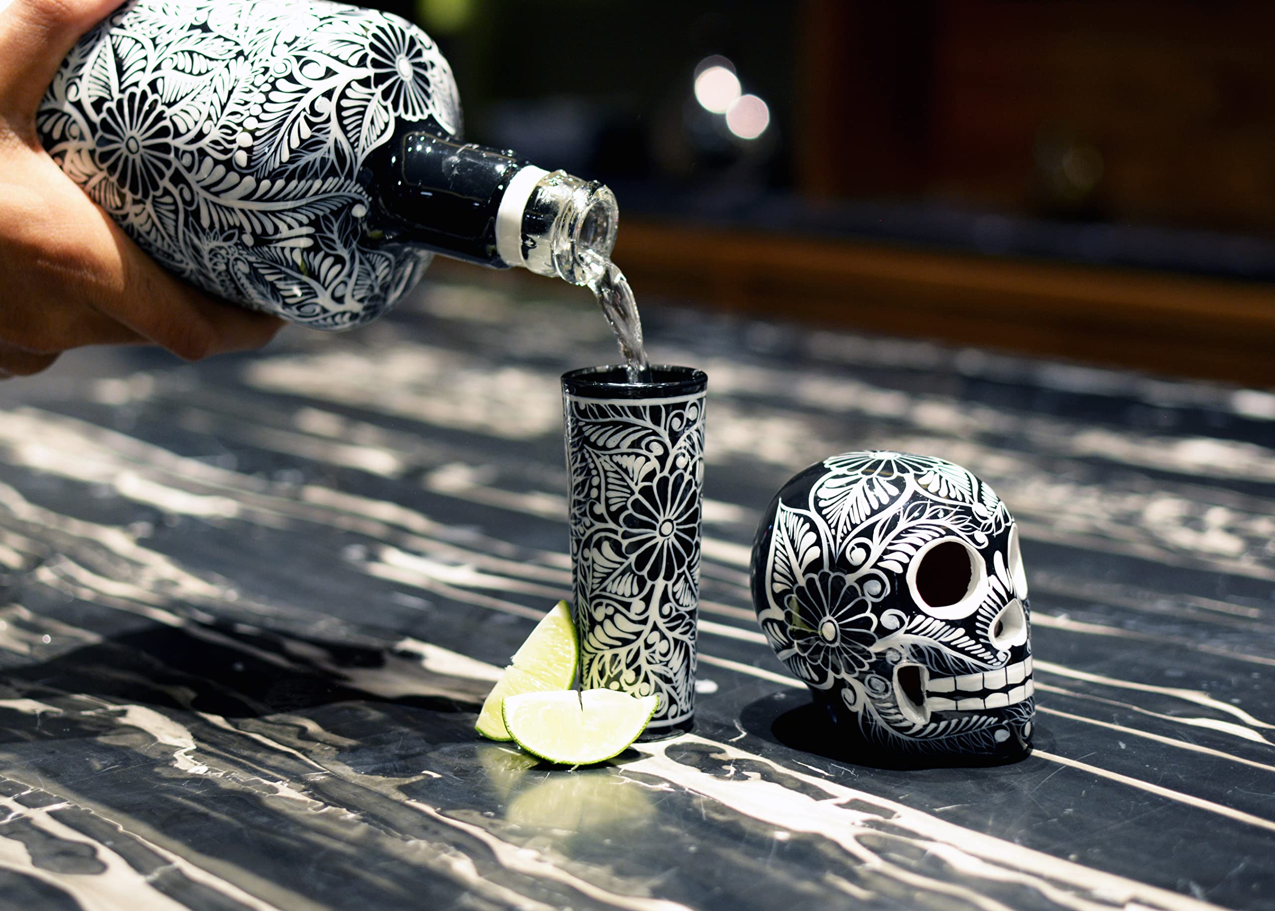 Clay skull head decanter is signed by the artist for a collectible touch