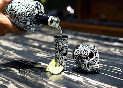 Clay skull head decanter is signed by the artist for a collectible touch