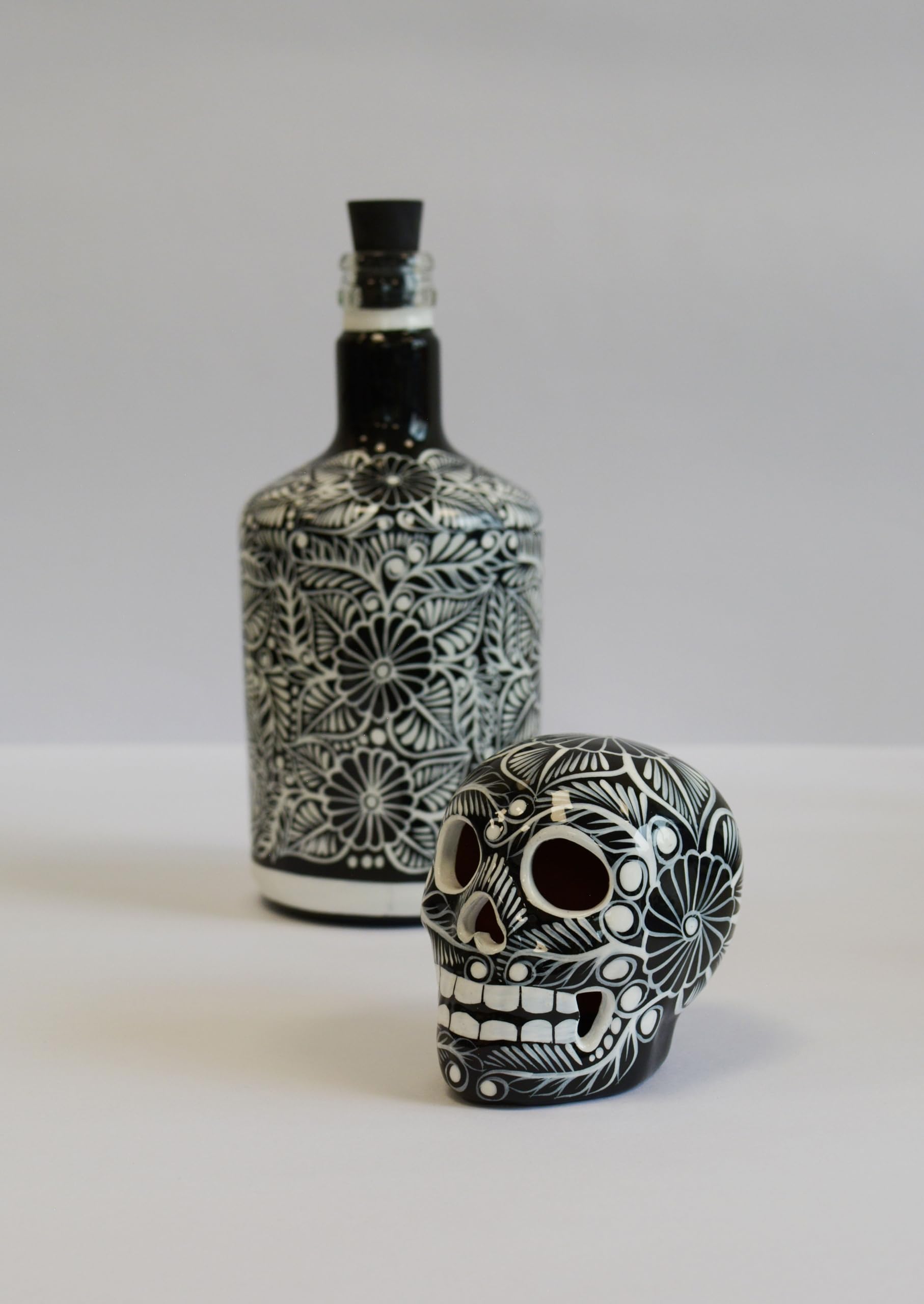 Glass decanter with cork and sombrero keeps drinks secure while adding charm