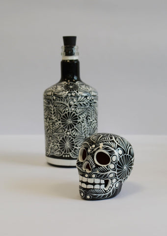Glass decanter with cork and sombrero keeps drinks secure while adding charm