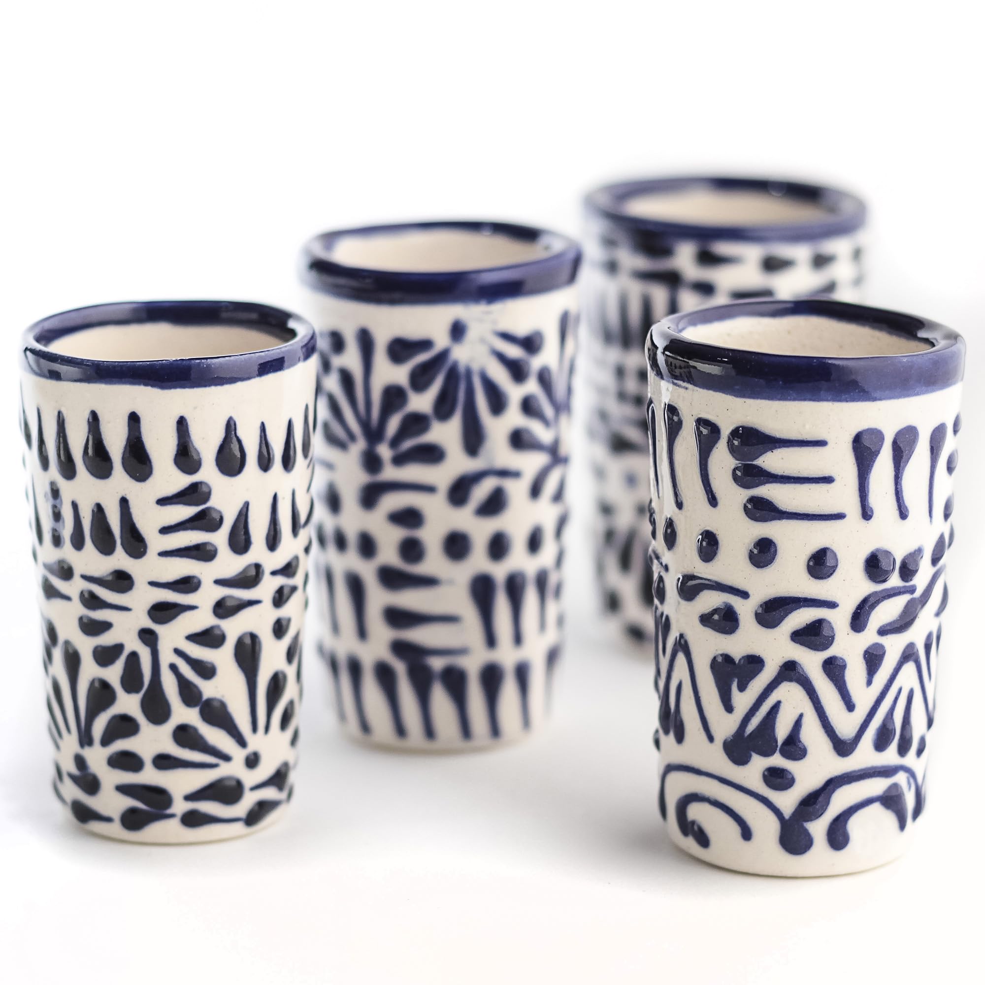 MEXTEQUIL Talavera blue lace shot glass celebrates artisan variation.