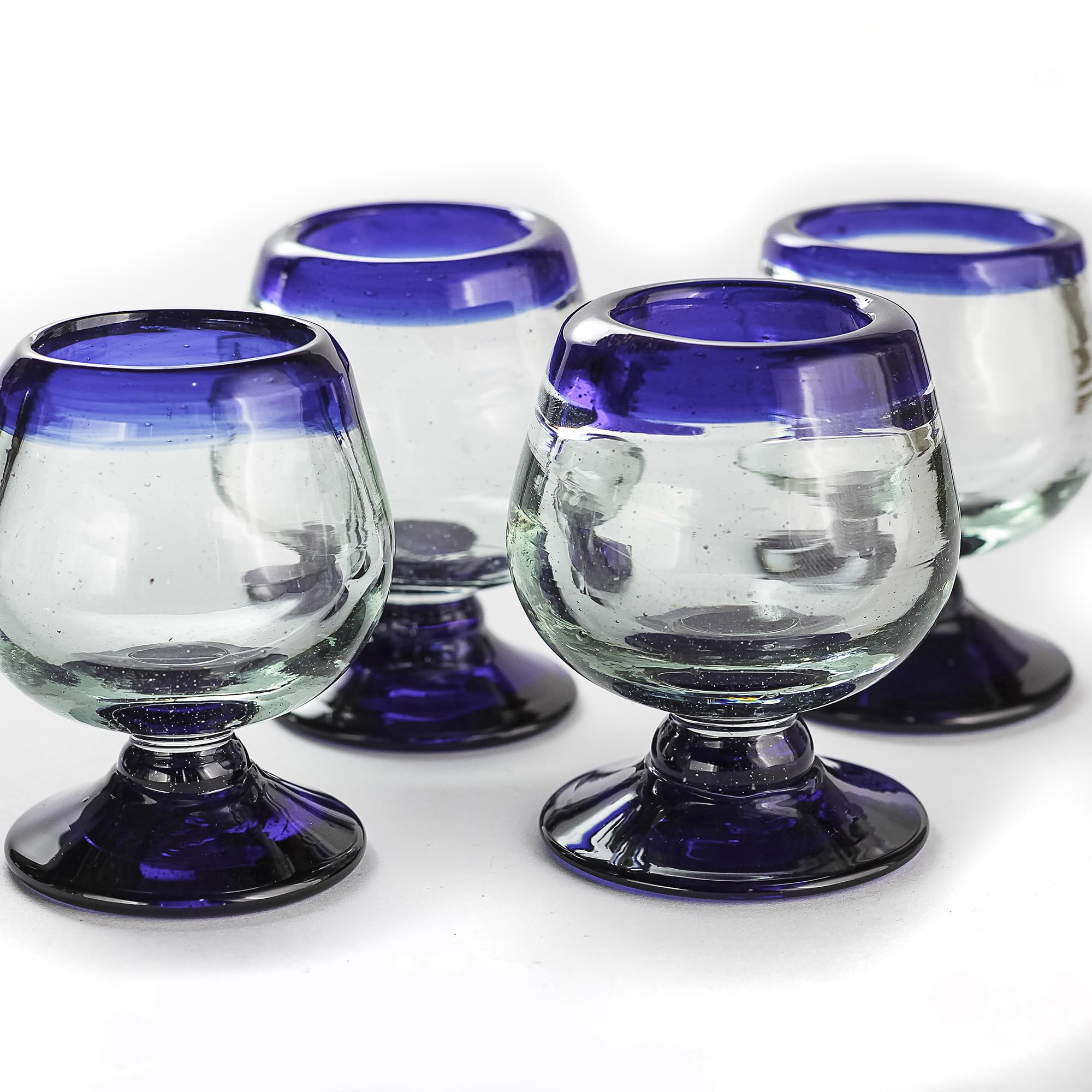 MEXTEQUIL 4-shot set with cobalt rim, ideal for tequila tastings and festive gatherings.