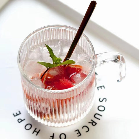 Mfacoy clear glass mugs on table ready for entertaining.