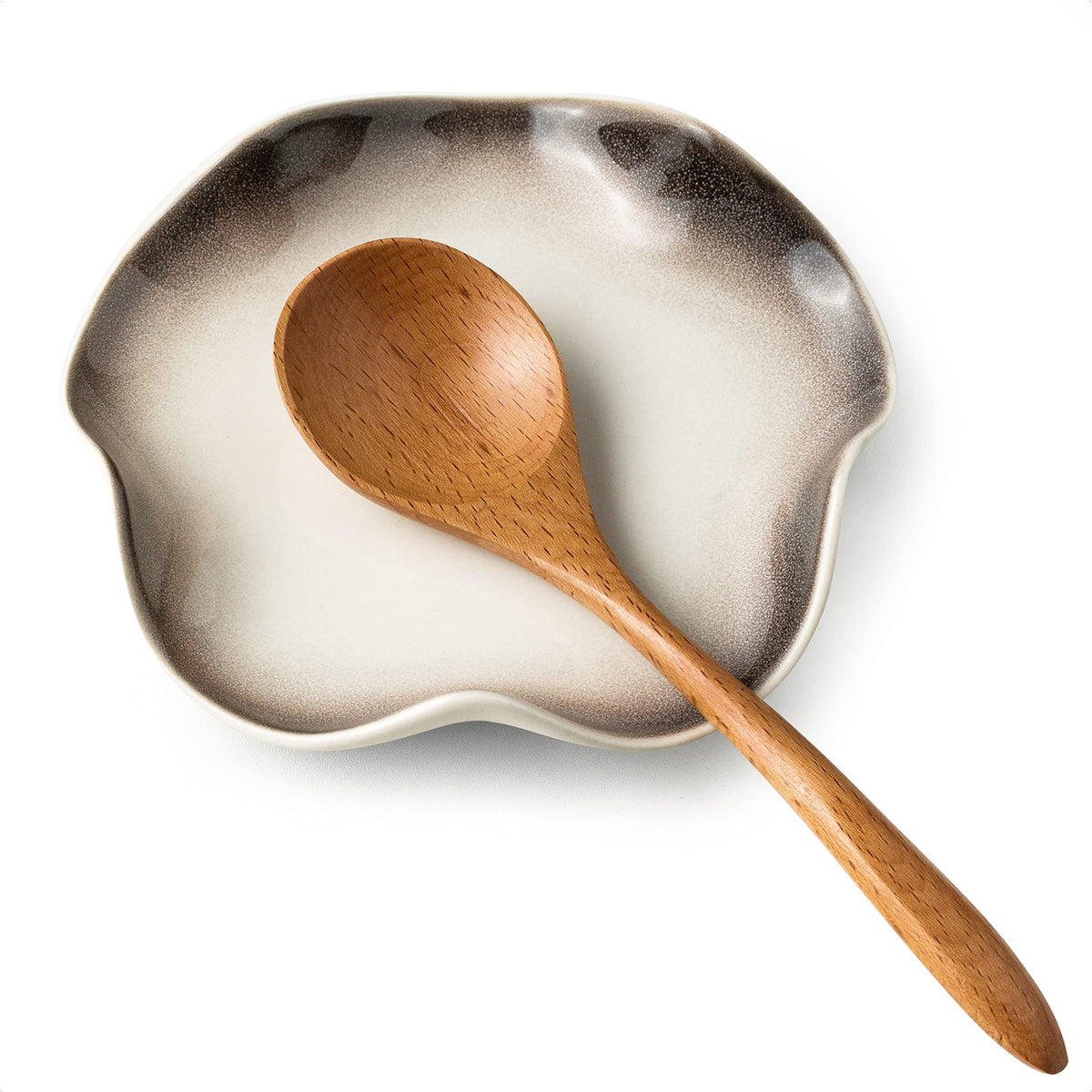 Miamolo ceramic spoon holder with flower shape keeps spoons neat on the stove.