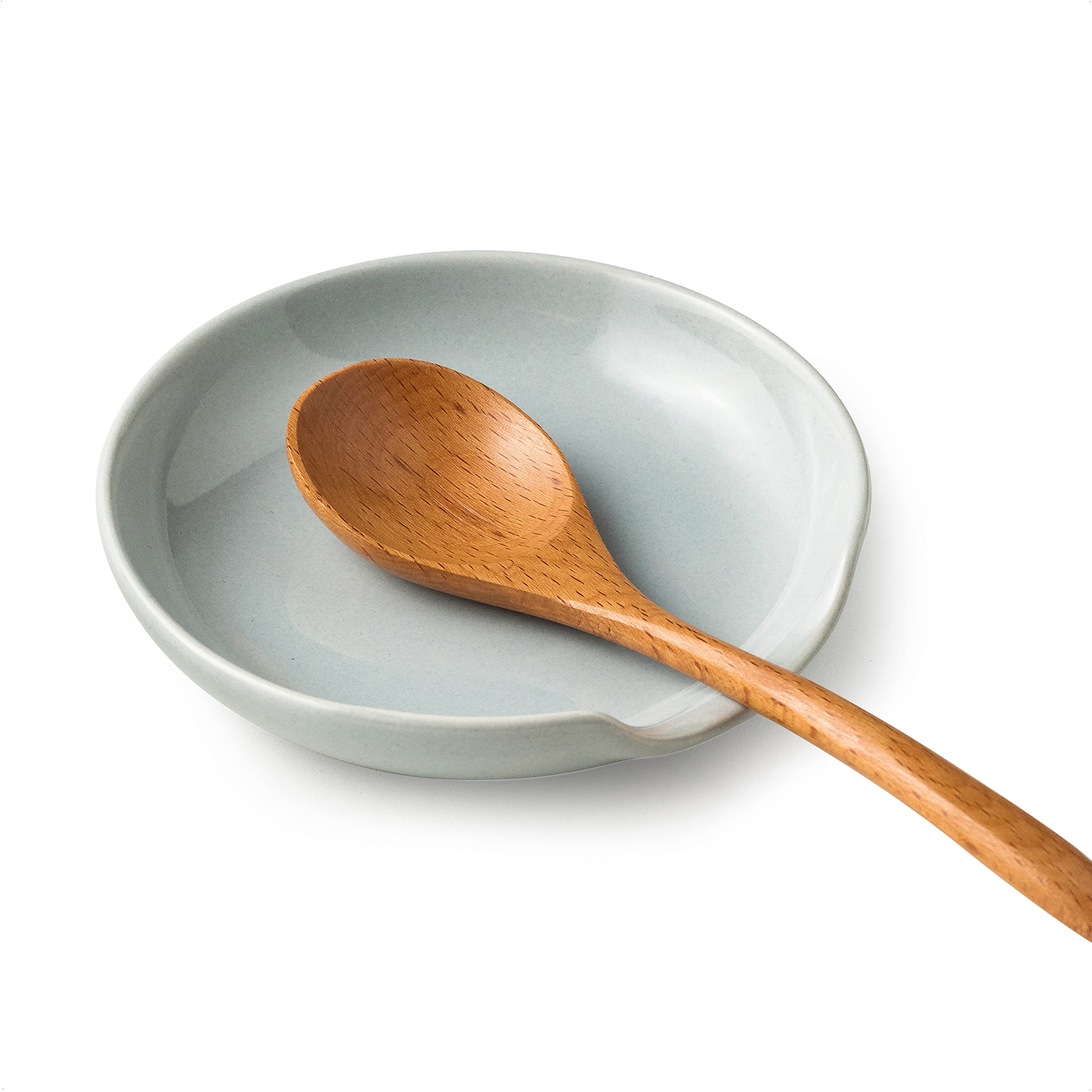 Miamolo ceramic spoon rest on counter keeps utensils organized and drips contained during cooking.