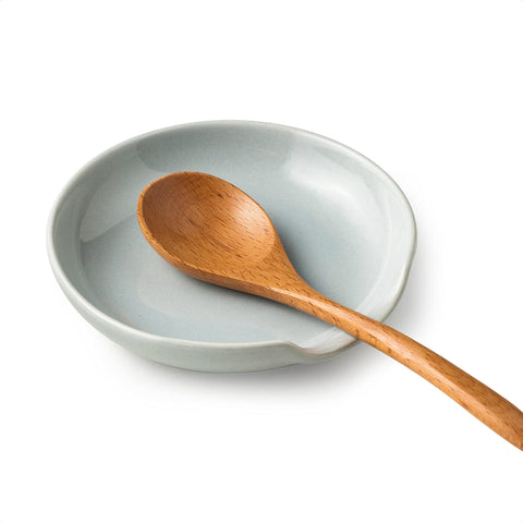 Miamolo ceramic spoon rest on counter keeps utensils organized and drips contained during cooking.