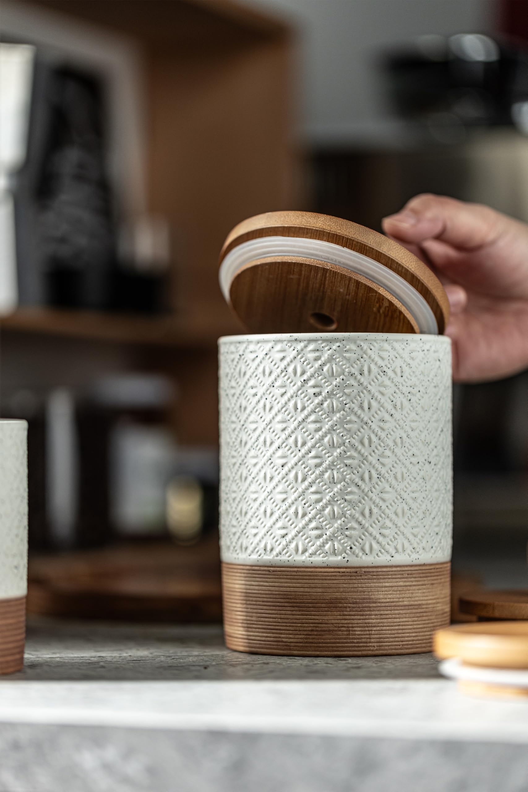 Miamolo canister embossed pattern adds farmhouse charm to kitchen storage.