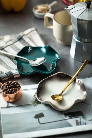 Sleek teal design complements modern kitchens and reduces clutter.