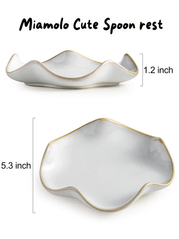Miamolo spatula holder complements decor while catching drips to protect surfaces
