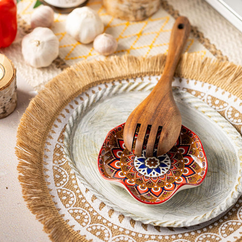 Miamolo spoon rest on counter complements Bohemian-inspired decor.