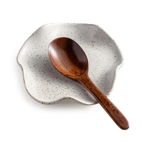 Miamolo spoon rest with speckled floral design keeping counters tidy and stylish