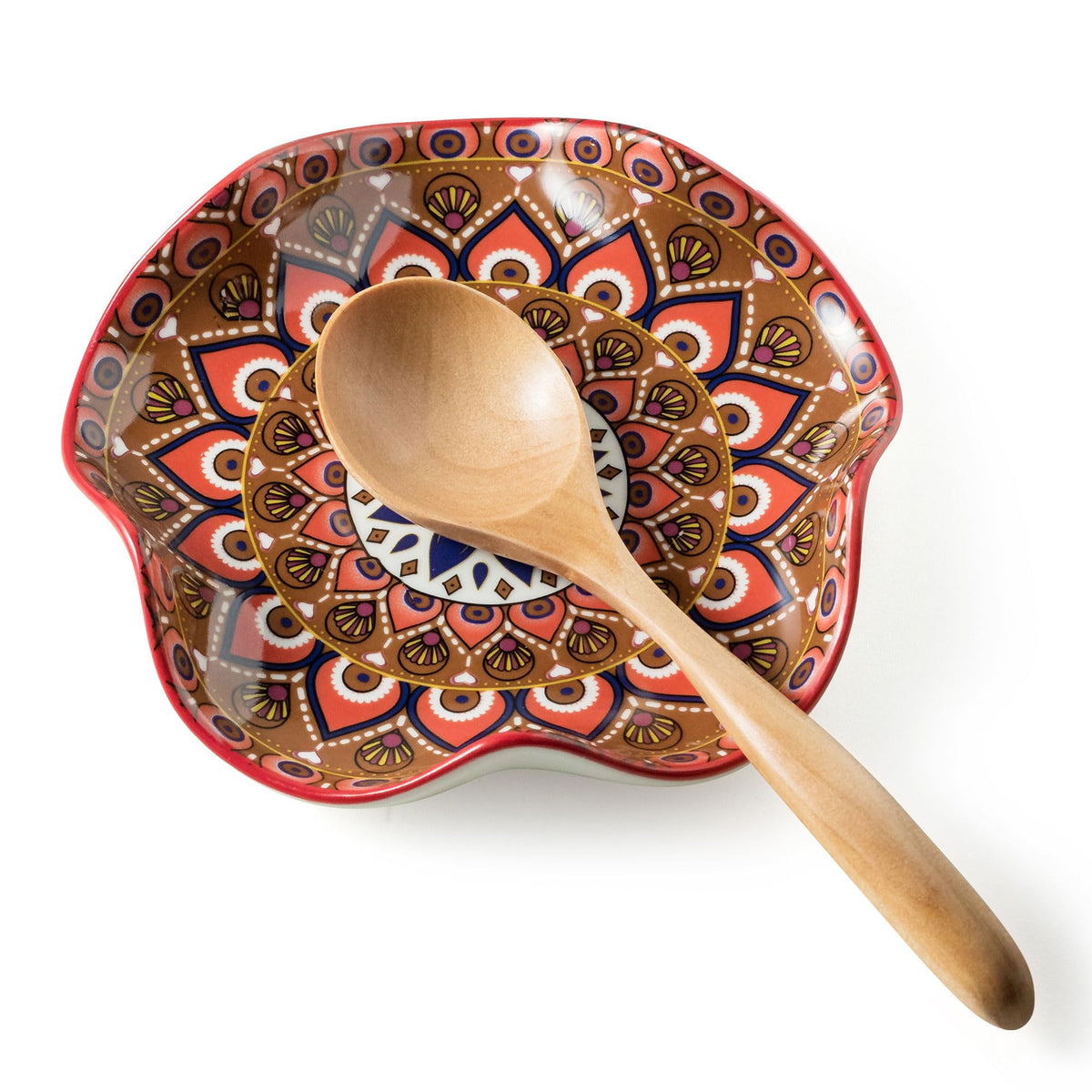 Miamolo spoon rest on stove top keeps utensils organized.
