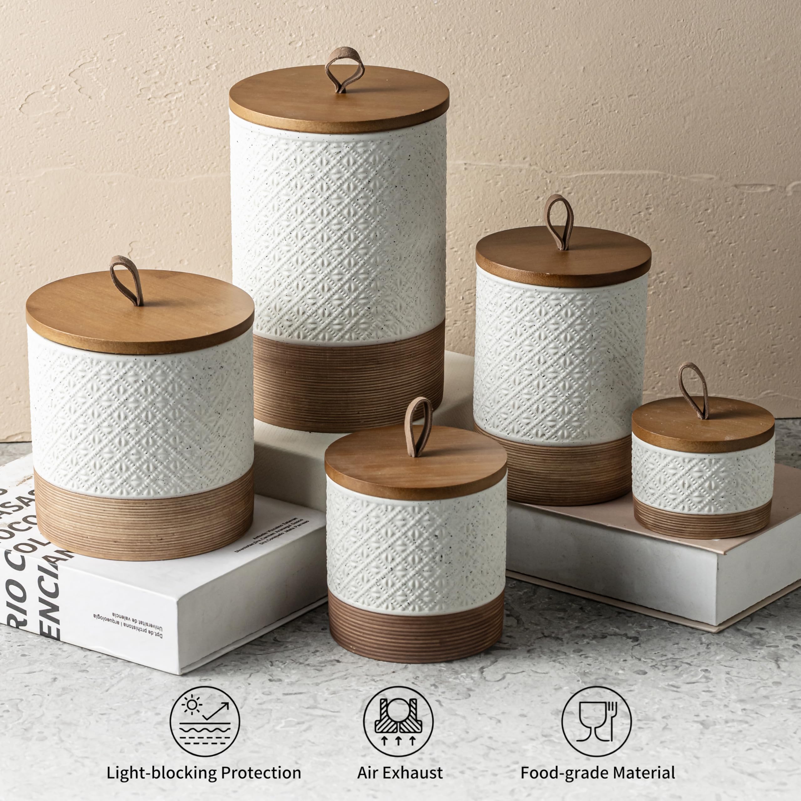 Miamolo white ceramic jar anchors countertop organization and style.