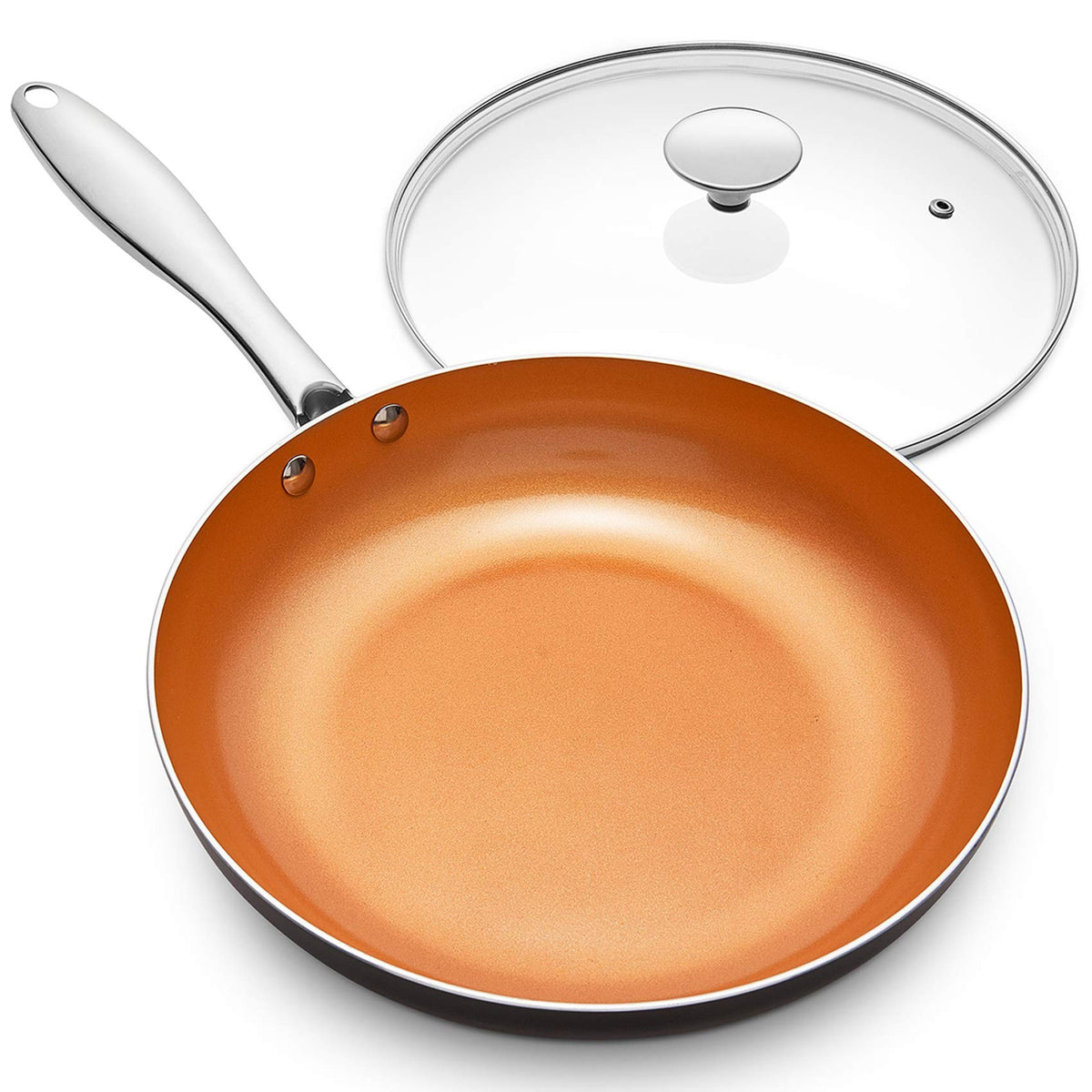 Michelangelo 10-inch copper nonstick pan with lid for versatile cooking and easy release.