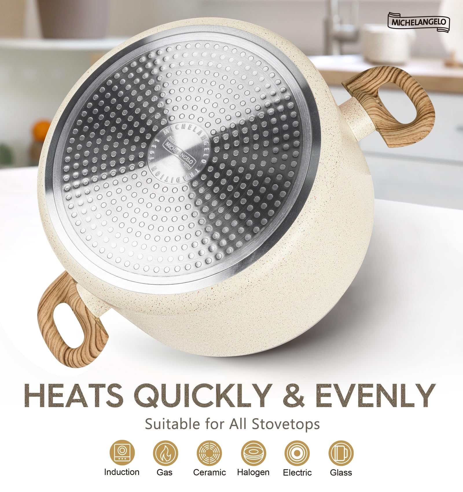 Michelangelo stock pot with ergonomic bakelite handles stay cool during cooking.