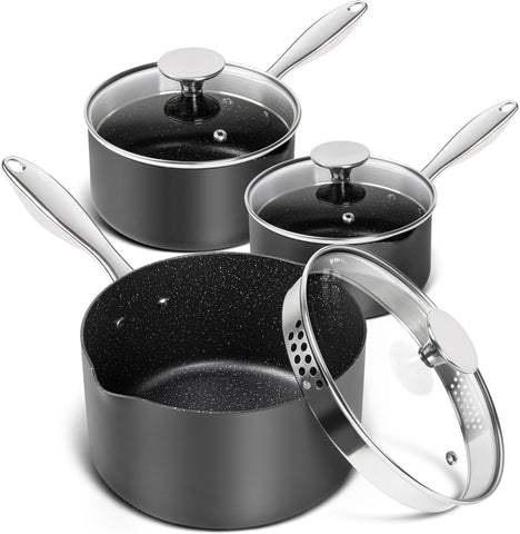 Michelangelo hard anodized saucepan set in three sizes for even heating and durability.