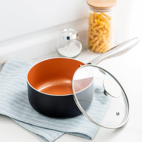 Michelangelo sauce pan copper surface: stylish cookware with durable nonstick interior.