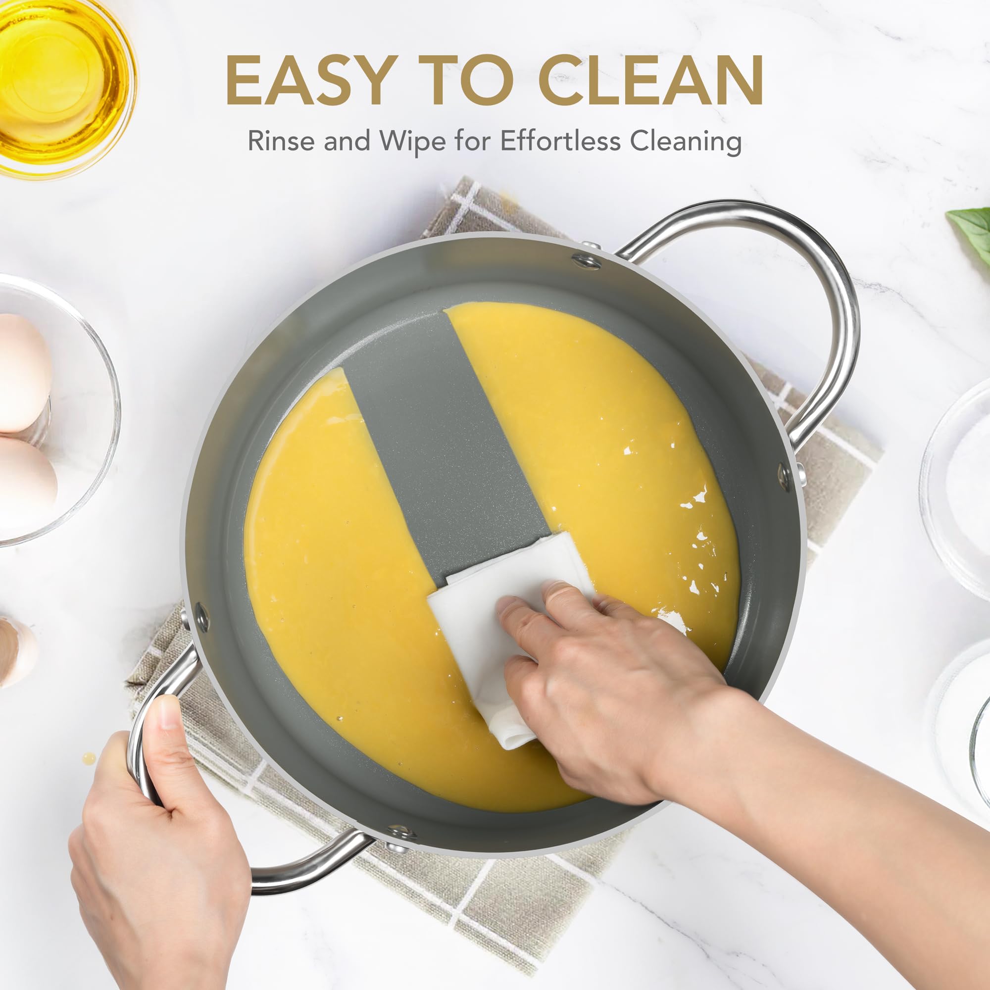 Michelangelo stockpot color options include creamy-yellow finish for stylish kitchens.