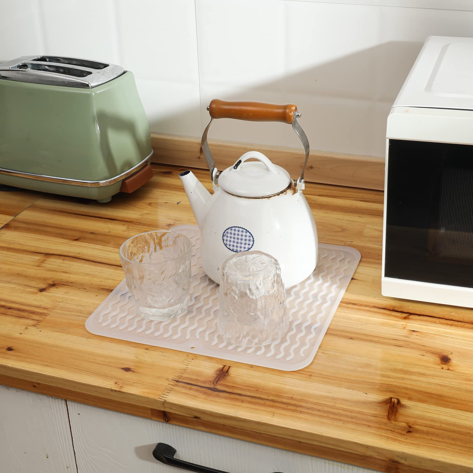 MicoYang silicone dish drying mat foldable and rollable for compact storage.