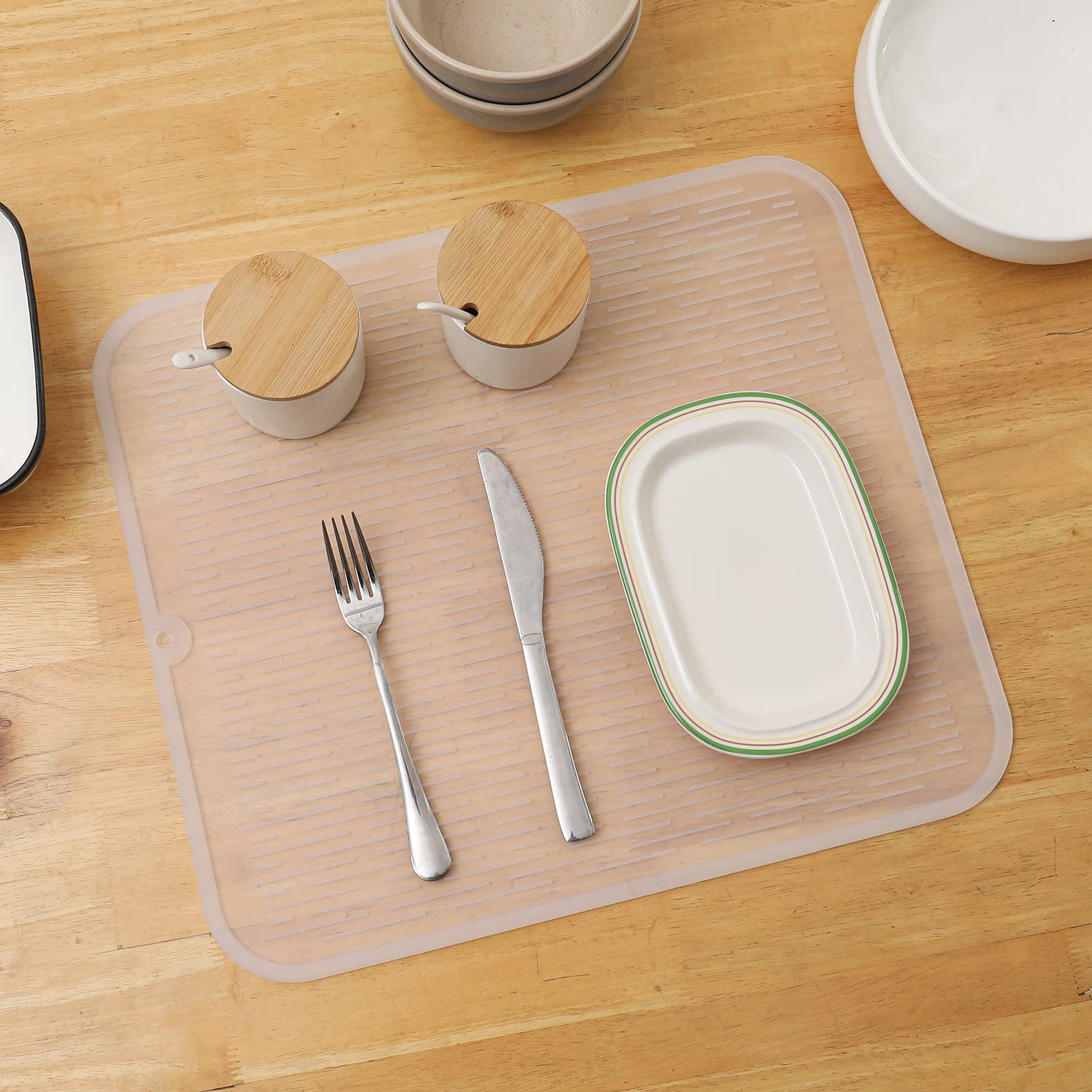 MicoYang silicone dish drying mat serving as a non-slip pet mat for feeding areas.