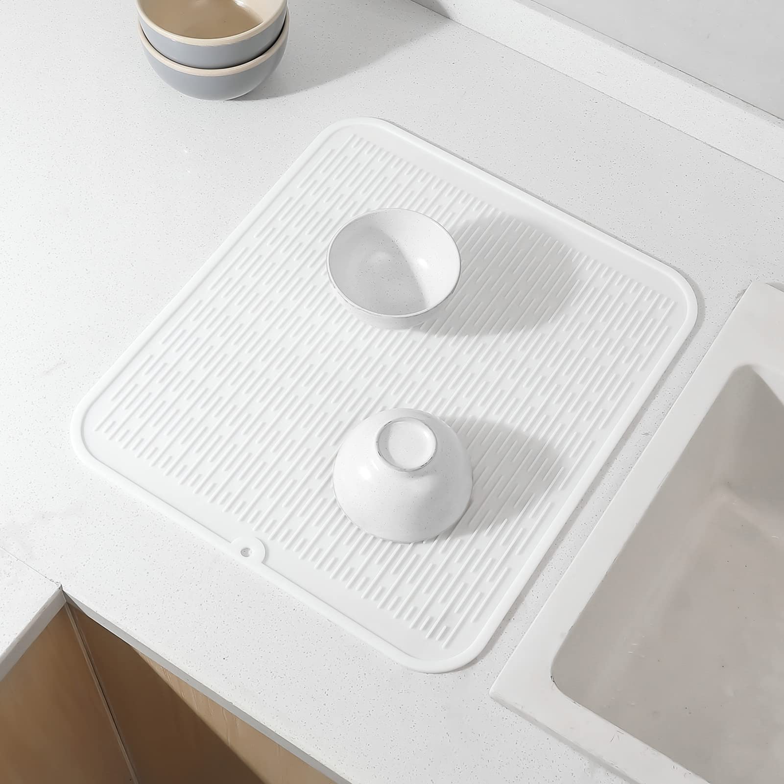 XL 18x16 inch mat covers countertops and sinks for versatile use