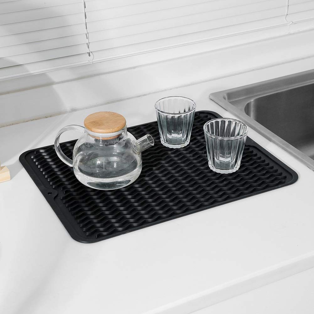 MicoYang silicone mat rolled for compact storage in a drawer or cabinet.