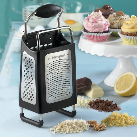 Microplane four-sided box grater safety cover keeps hands safe.