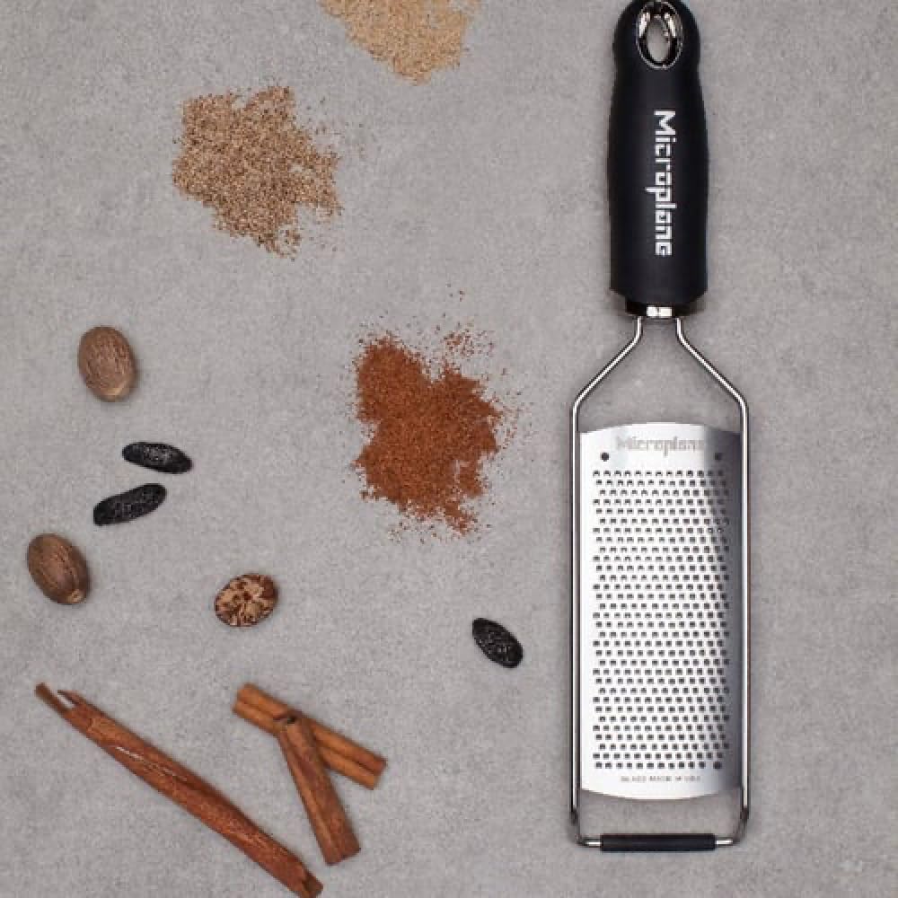 Microplane Gourmet Series grater grinds garlic and ginger powder quickly.