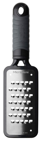 Microplane Home Series Extra Coarse Grater creates thick cheese shavings for hash browns and more