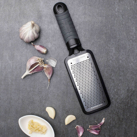 Microplane Home Series grater with soft touch handle for comfortable grip.