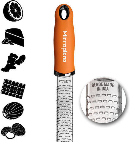 Microplane Premium Classic Zester Orange grating citrus to brighten sauces and salads.