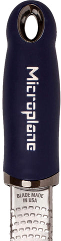 Microplane Premium Citrus Zester in dark blue ginger grating for fresh paste