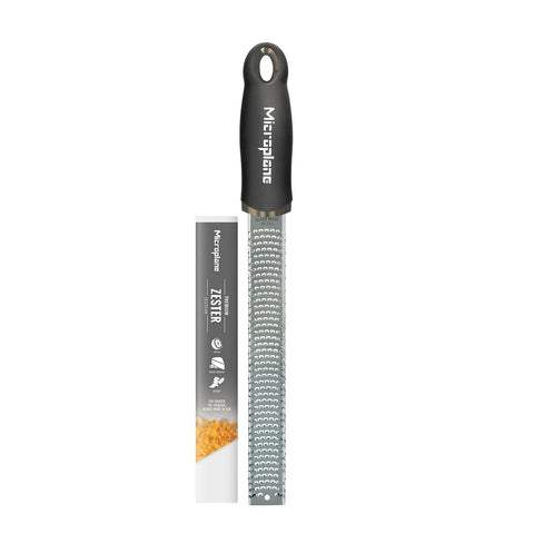 Microplane Premium Classic Zester close-up on black handle for citrus zest