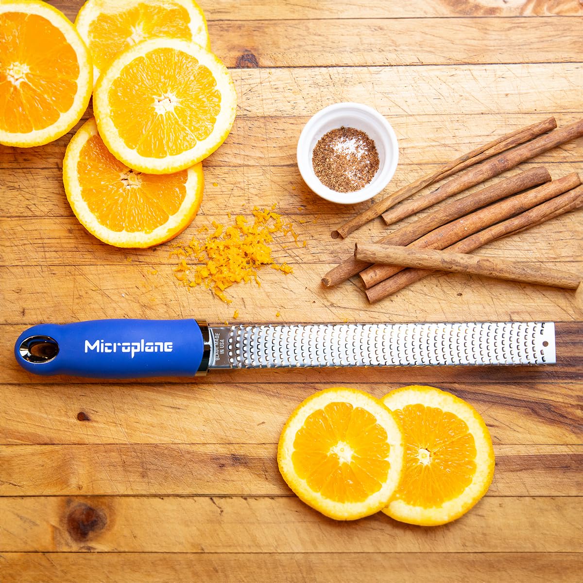 Microplane zester citrus zest on a dish for bright dressings