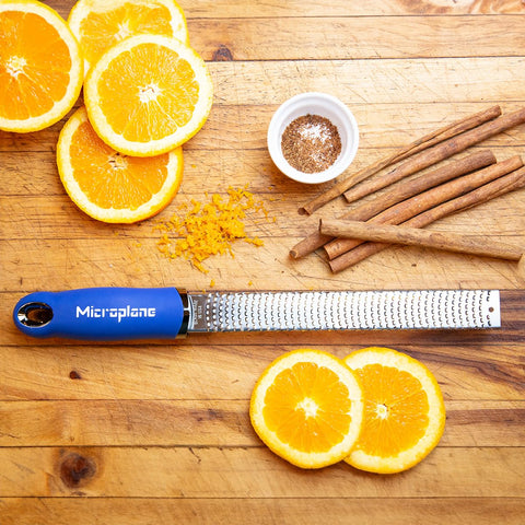 Microplane zester citrus zest on a dish for bright dressings