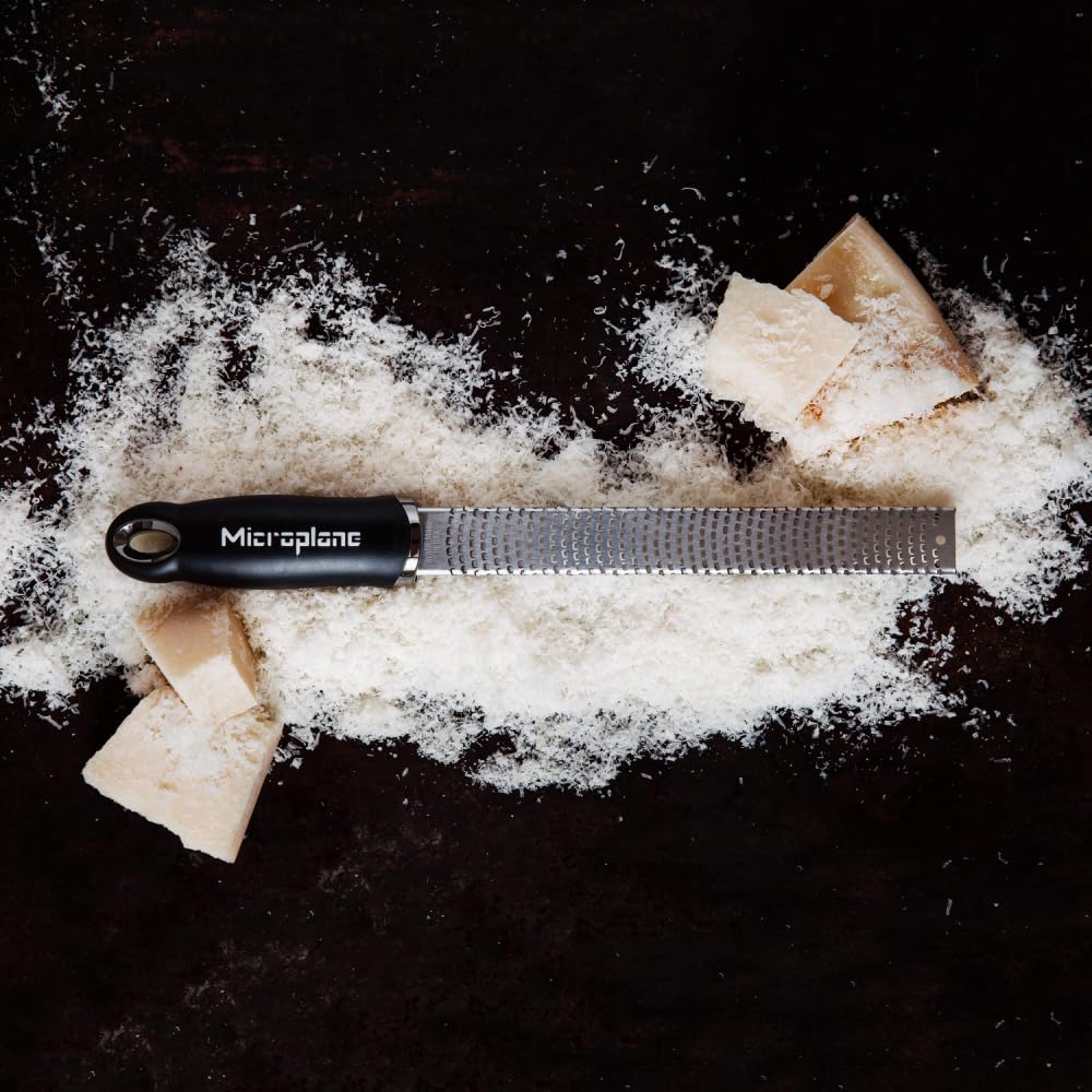 Microplane Premium Classic Zester shaving nutmeg for baking