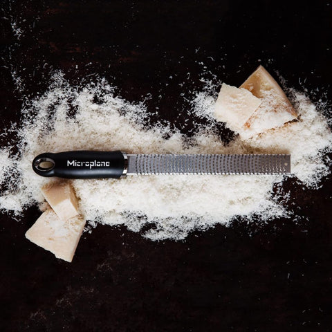 Microplane Premium Classic Zester shaving nutmeg for baking
