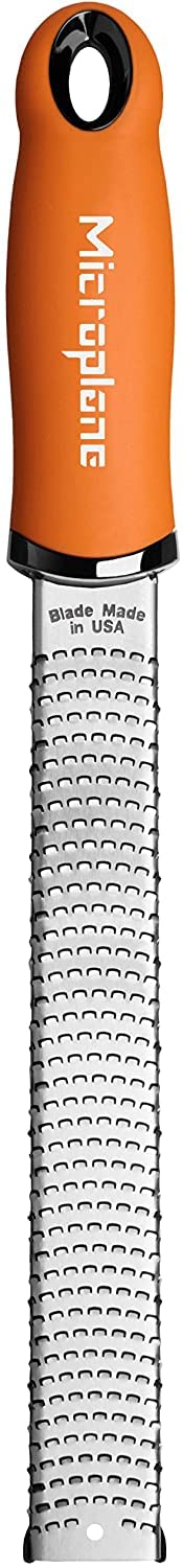 Microplane Premium Classic Zester Orange blade closeup emphasizes ultra sharp USA-made blades.