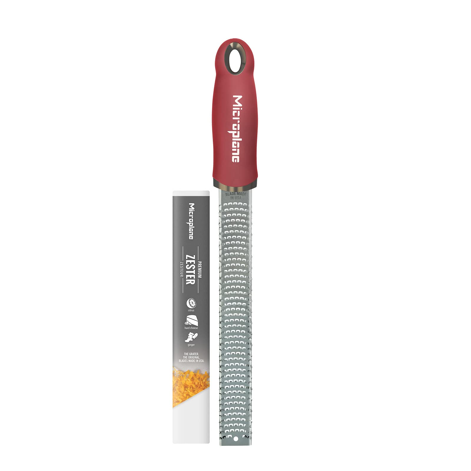 Microplane Premium Classic Zester close-up: pomegranate red handle for citrus zest.