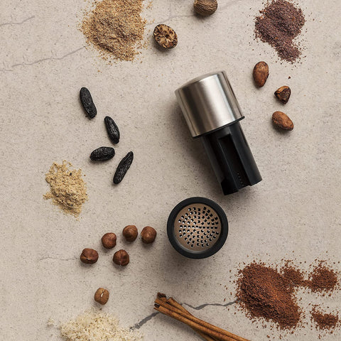 Airtight top compartment keeps unused spices ready for next grind