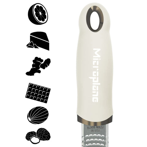 Microplane Zester Grater blade close-up shows ultra sharp stainless steel for precise grating.